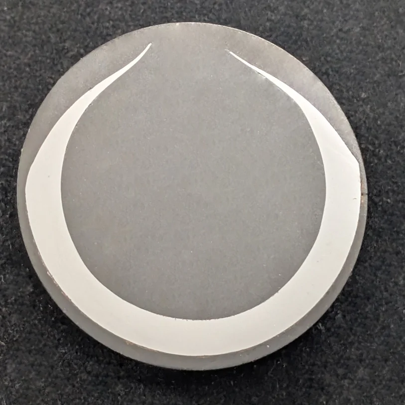 Boiler Tube Failure Analysis. Cross-sectional sample of a ruptured carbon-steel boiler tube showing fireside wall loss from molten salt corrosion.